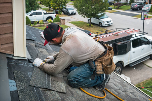 Professional Roofing technician working in Breezewood, PA
